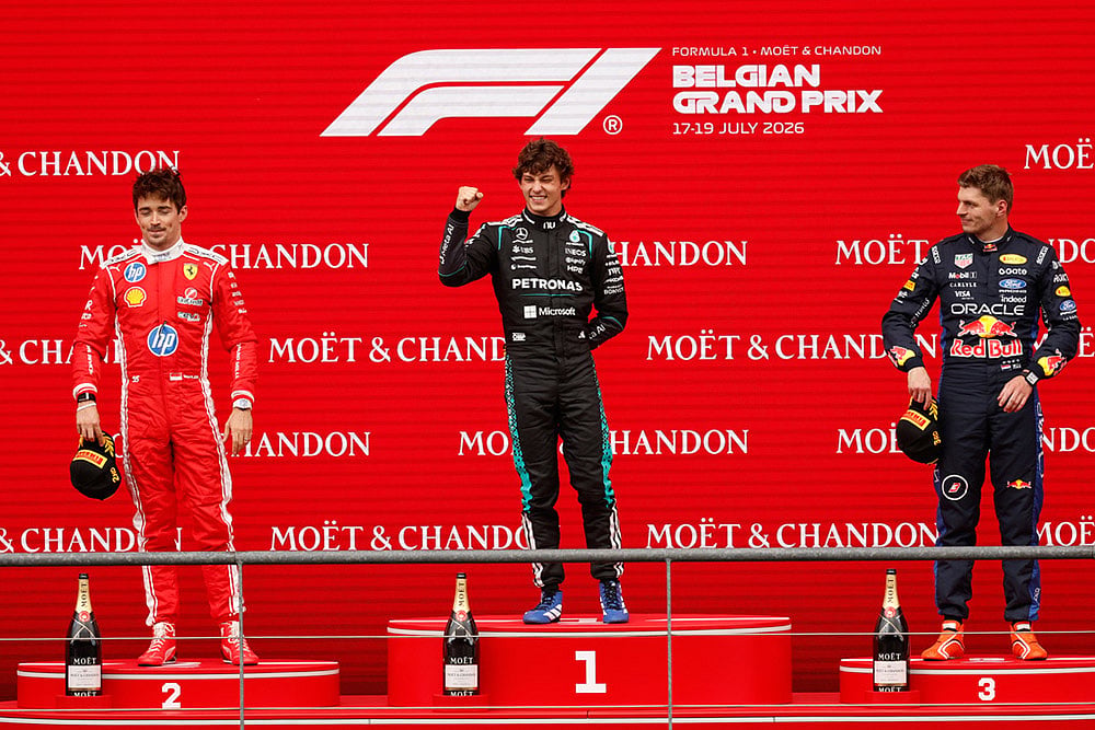 | Photo: AP/Geert Vanden Wijngaert : Mercedes driver Andrea Kimi Antonelli of Italy, center, stands on the podium with Ferrari driver Charles Leclerc of Monaco, left, and third place Red Bull driver Max Verstappen of the Netherlands, after winning the Formula One Grand Prix at the Spa-Francorchamps racetrack in Spa, Belgium.