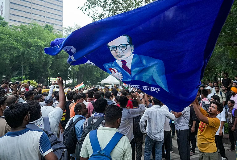 Cockroach Janata Party (CJP) supporters raise slogans as they gather ahead of a protest march, at the Jantar Mantar, in New Delhi, early Monday, July 20, 2026. - | Photo: PTI/Karma Bhutia
