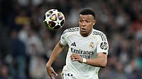 When Does Top Five Domestic Leagues 2026-27 Season Start? Know Return Date Of Star Footballers After End Of World Cup | Photo: AP/Bernat Armangue : Real Madrid's Kylian Mbappe watches the ball during the Champions League quarterfinal first leg soccer match between Real Madrid and Bayern Munich in Madrid, Spain.
