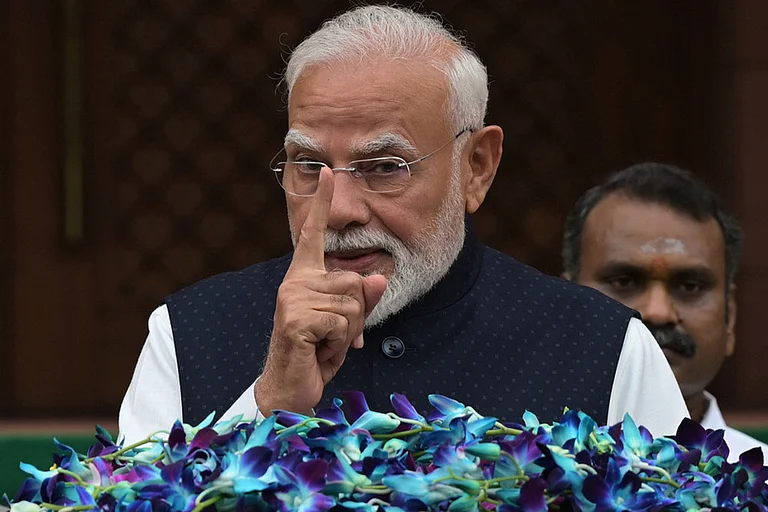 Indian Prime Minister Narendra Modi addresses the media outside Parliament House on the opening day of the monsoon session, in New Delhi, India. - | Photo: AP/Sanjeev Rastogi