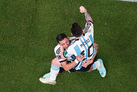 Argentina's Lionel Messi celebrates after scoring his side's opening goal against Mexico during the World Cup group C soccer match in Lusail, Qatar, Nov. 26, 2022. 