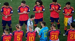 Argentina's Lionel Messi (10) walks between Spain players during the medal ceremony after the World Cup final soccer match between Spain and Argentina in East Rutherford, N.J., near New York, Sunday, July 19, 2026. - (AP Photo/Matt Slocum)
