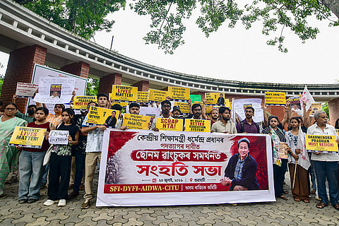 Members of various organisations stage a protest in support of activist Sonam Wangchuk and the Cockroach Janta Party's protest at Delhi's Jantar Mantar, demanding Union Education Minister Dharmendra Pradhan’s resignation, in Guwahati.