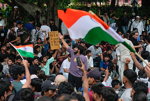 Cockroach Janata Party (CJP) supporters raise slogans as they gather ahead of a protest march, at the Jantar Mantar, in New Delhi, early Monday, July 20, 2026. .
