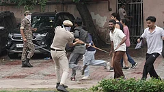Security personnel stop Cockroach Janata Party (CJP) supporters as they raise slogans during a protest march, at Sansad Marg, in New Delhi, Monday, July 20, 2026. - | Photo: Tribhuvan Tiwari/Outlook