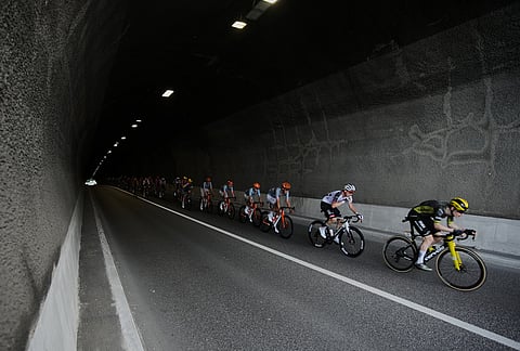 The pack rides during the fifteenth stage of the Tour de France cycling race, from Champagnole to Plateau de Solaison, France, Sunday, July 19, 2026.