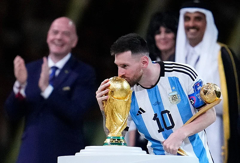 Messi lifting World Cup trophy iconic picture