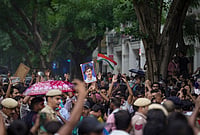 | Photo: PTI/Karma Bhutia : Cockroach Janata Party (CJP) supporters raise slogans, near Jantar Mantar ahead of a protest march, in New Delhi, early Monday, July 20, 2026. Delhi Police is on high alert ahead of the Monsoon Session of Parliament and CJP's proposed "Chalo Sansad" march on Monday, with heavy deployment of personnel visible at every nook and corner around Jantar Mantar, Parliament and other key locations. 