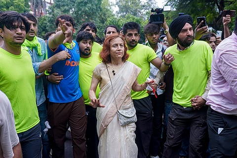 Gitanjali J Angmo, wife of educator and climate activist Sonam Wangchuk, arrives at Jantar Mantar ahead of Cockroach Janata Party’s (CJP) protest march, in New Delhi.