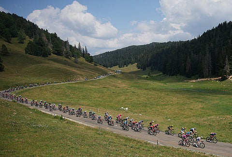 The pack rides during the fifteenth stage of the Tour de France cycling race, from Champagnole to Plateau de Solaison, France, Sunday, July 19, 2026. 