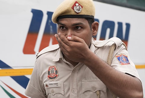 An injured police officer during a Cockroach Janata Party protest march, at Sansad Marg, in New Delhi, Monday, July 20, 2026. 
