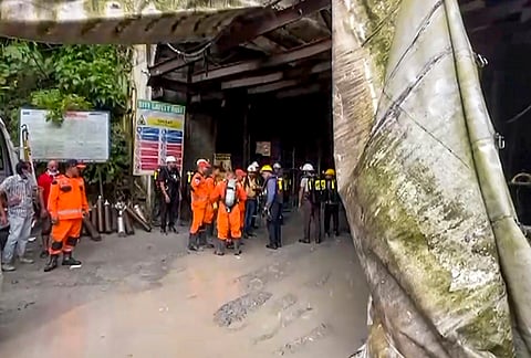 Rescue personnel and emergency responders at the site of the collapse inside the under-construction NHPC Teesta Stage VI Hydroelectric Project tunnel, where a multi-agency operation is underway to trace workers trapped following the incident, in Namchi district, Sikkim, Tuesday, July 21, 2026. 