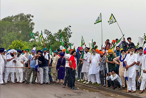 Farmers march towards Delhi to participate in the Kisan Mahapanchayat against the proposed India-US trade deal, at Shambhu Border, Haryana, Tuesday, July 21, 2026. 