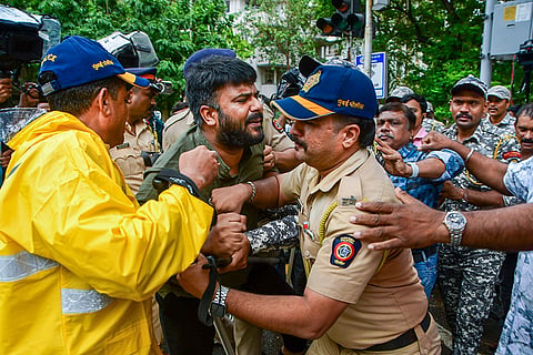 Police detain people during a protest in support of activist Sonam Wangchuk and the Cockroach Janta Party’s (CJP) protest at Delhi's Jantar Mantar, demanding Union Education Minister Dharmendra Pradhan’s resignation, near Chaityabhoomi in Mumbai.