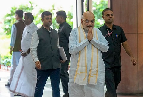 Union Home Minister Amit Shah arrives for 'Mangal Milan' meeting at GMC Balayogi Auditorium in the Parliament Library Building, in New Delhi.