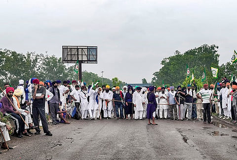 Farmers from various organisations march towards Delhi to participate in the Kisan Mahapanchayat against the proposed India-US trade deal, at the Shambhu Border, in Ambala district, Haryana, Tuesday, July 21, 2026. The protest, organised under the banner of the Desh Bachao Morcha, opposes the proposed trade agreement over concerns that it could allow cheaper American agricultural and dairy imports, threatening the livelihoods of Indian farmers. 