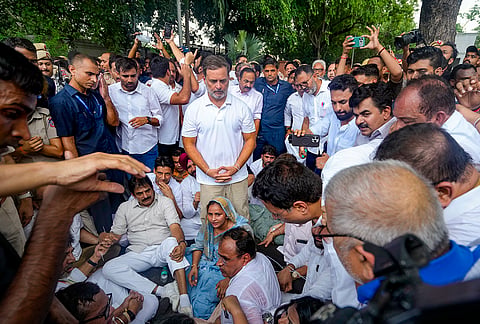 Leader of Opposition in the Lok Sabha Rahul Gandhi with Kerala Chief Minister VD Satheesan, Congress MP KC Venugopal, and others, stages a sit-in protest near the Prime Minister's residence over alleged irregularities in the NEET examination, in New Delhi, Tuesday, July 21, 2026. 