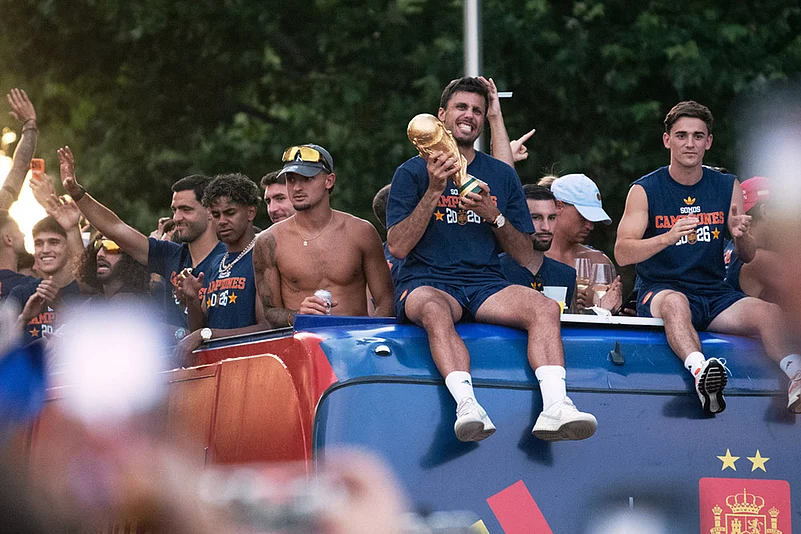 Spain’s World Cup winners return home