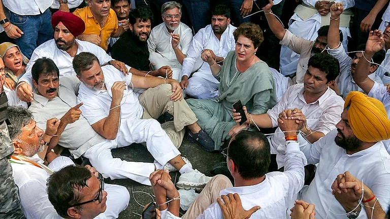 Leader of Opposition in the Lok Sabha Rahul Gandhi with Congress MPs Priyanka Gandhi Vadra, KC Venugopal and others stage a sit-in protest near the Prime Minister's residence over alleged irregularities in the NEET examination, in New Delhi, Tuesday, July 21, 2026. - | Photo: PTI