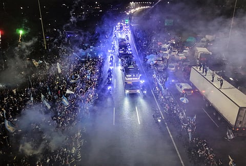 The bus transporting Argentina's players arrives in Ezeiza, Argentina, Monday, July 20, 2026, after Argentina lost to Spain in the World Cup final. 