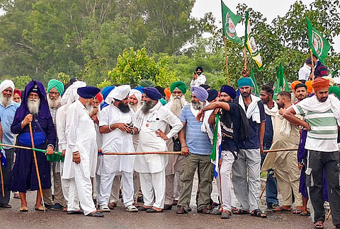 Farmers march towards Delhi to participate in the Kisan Mahapanchayat against the proposed India-US trade deal, at Shambhu Border, Haryana, Tuesday, July 21, 2026.