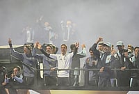 Lionel Messi Absent As Argentina Receive Hero's Welcome After FIFA World Cup 2026 | Photo: AP/Gustavo Garello : Argentina coach Lionel Scaloni, center, surrounded by team members, waves to fans from a bus heading to the Argentine Football Association headquarters in Ezeiza, on the outskirts of Buenos Aires, Monday, July 20, 2026, after returning from the World Cup final, where they lost to Spain.