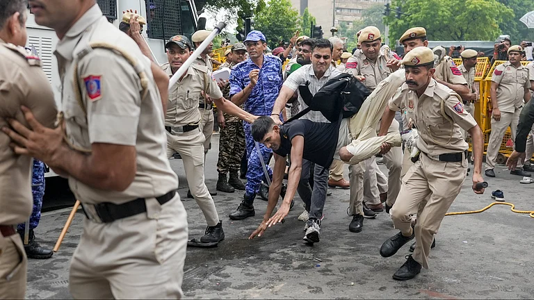 Security personnel detain CJP supporters | July 20, 2026. - PTI/KARMA