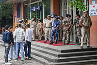 Delhi Police Ordered RAF to Fire Pellet Guns at Protesters, Reveals General Diary Entry | Photo: PTI : Rapid Action Force (RAF) and Police personnel stand guard outside Patel Chowk Metro station after it was closed due to 'security reasons', in New Delhi.