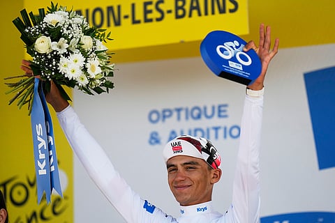 Mexico's Isaac Del Toro, wearing the best young rider's white jersey, celebrates on the podium after the sixteenth stage of the Tour de France cycling race, an indivdual time-trial with start in Evian-Les-Bains and finish in Thonon-les-Bains, France.