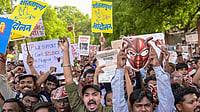 AIU Asks Universities To Counsel Students Against Exam Protests, Focus On Academics | Photo: PTI : Cockroach Janta Party (CJP) supporters stage a protest demanding the resignation of Union Education Minister Dharmendra Pradhan over last month's NEET (UG) paper leak issue, in Nagpur.