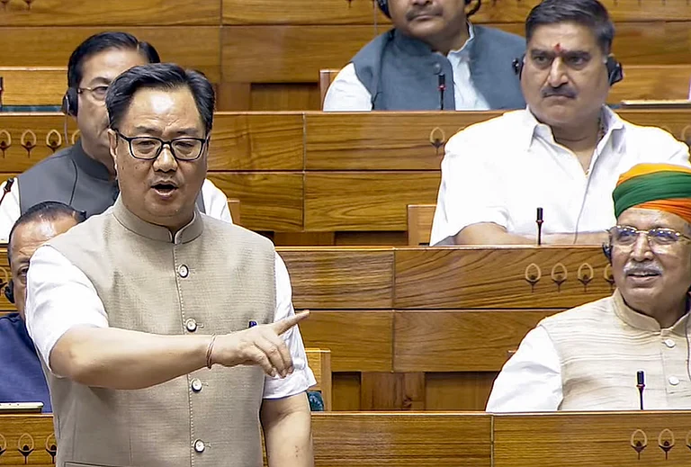Union Minister of Parliamentary Affairs Kiren Rijiju speaks in the Lok Sabha during the Monsoon Session of the Parliament, in New Delhi. - Sansad TV via PTI