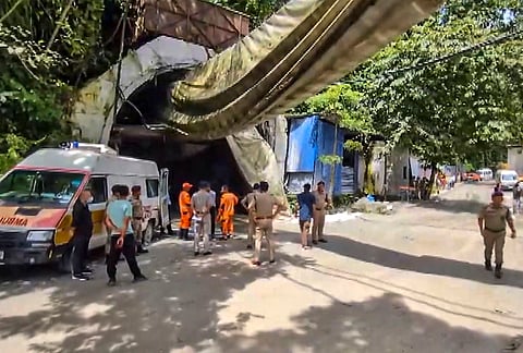 Officials present at the site after a tunnel under construction collapsed following an explosion of suspected methane gas, leaving at least 20 workers killed and five others trapped for over 24 hours, in Namchi district, Sikkim.