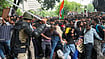 Pellet Guns To Shock Batons: The History Of Crowd Control Weapons In India Photo: PTI/Karma Bhutia : Security personnel stop Cockroach Janata Party (CJP) supporters as they raise slogans near Jantar Mantar during a protest march, in New Delhi.