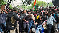 Pellet Guns To Shock Batons: The History Of Crowd Control Weapons In India Photo: PTI/Karma Bhutia : Security personnel stop Cockroach Janata Party (CJP) supporters as they raise slogans near Jantar Mantar during a protest march, in New Delhi.