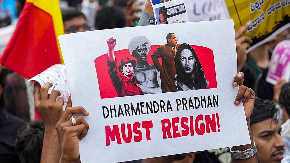 Rajasthan Cong Marches Towards BJP HQ, Demands Pradhan's Resignation Over Paper Leak - Photo: PTI/Shailendra Bhojak