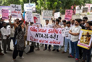 | Photo: PTI : Disha Students' Organization (DSO) members stage a protest in support of Cockroach Janta Party (CJP) and demanding the resignation of Union Education Minister Dharmendra Pradhan over alleged irregularities in the NEET examination, in Patna, Tuesday, July 21, 2026.