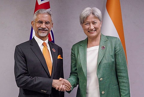 Union External Affairs Minister S Jaishankar exchanges a handshake with Australian Foreign Minister Penny Wong ahead of the QUAD Foreign Ministers' Meeting, in Manila, Philippines. 