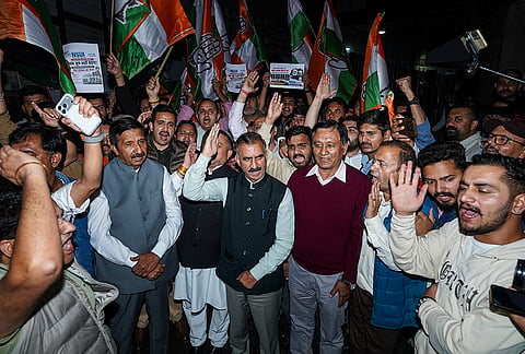 Himachal Pradesh Chief Minister Sukhvinder Singh Sukhu and Congress workers stage a protest demanding the resignation of Union Education Minister Dharmendra Pradhan over alleged irregularities in the NEET examination, in Shimla, Tuesday, July 21, 2026. 