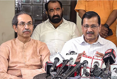 AAP National Convenor Arvind Kejriwal and Shiv Sena (UBT) chief Uddhav Thackeray during a joint press conference over the ongoing student protests and the closure of several Delhi Metro stations, in New Delhi.
