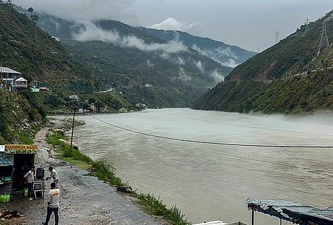 A view of the swollen Chenab River following incessant monsoon rains, in Doda, Jammu and Kashmir, Tuesday, July 21, 2026. Continuous rainfall over the past 48 hours has led to a sharp rise in the river's water level, prompting controlled water discharge from downstream reservoirs, including the Baglihar and Salal dams. 