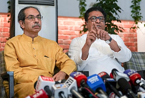 Maharashtra Navnirman Sena (MNS) President Raj Thackeray, right, and Shiv Sena (UBT) chief Uddhav Thackeray address a joint press conference, to announce a joint protest march to be held on Sunday, at Shivteerth, in Mumbai.