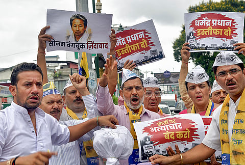AAP workers stage a protest in solidarity with climate activist Sonam Wangchuk and demand the resignation of Union Education Minister Dharmendra Pradhan over the NEET paper leak issue, in Dehradun, Uttarakhand.