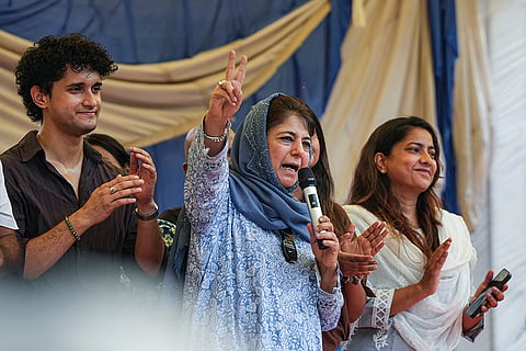 Peoples Democratic Party (PDP) president Mehbooba Mufti addresses students during the ongoing protest over the alleged NEET-UG examination irregularities at Jantar Mantar, in New Delhi. Cockroach Janta Party (CJP) chief spokesperson Saurav Das, left, and others are also seen.