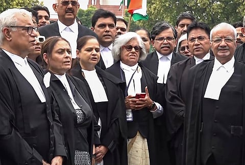 Advocates gather on the Supreme Court premises to read the Preamble to the Constitution in solidarity with protesting students and against the alleged police action at Jantar Mantar, in New Delhi.