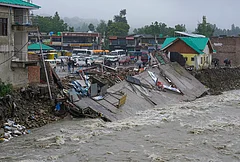 A damaged embankment along a swollen stream following floods and rainfall, in Khag area, Budgam district, Jammu and Kashmir, Wednesday, July 22, 2026. - | Photo: PTI/S Irfan