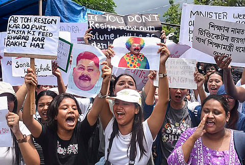 Students’ Federation of India (SFI) members stage a protest demanding the resignation of Union Education Minister Dharmendra Pradhan over alleged irregularities in the NEET examination, at Chachal ground in Guwahati, Thursday, July 23, 2026. 