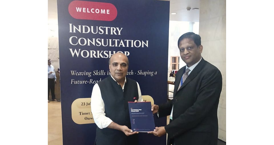 'The Factory That Proves Itself ' book authored by REACH being presented to Shri.Premal Udani, Chairman, Apparel Sector Skill Council,  and Former Chairman, Apparel Export Promorion Council - Today at Hyatt Regency, Delhi - null