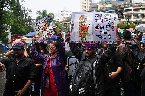 Protestors gather in support of Cockroach Janta Party and demand Union Education Minister Dharmendra Pradhan’s resignation, near Shivaji Park in Mumbai.