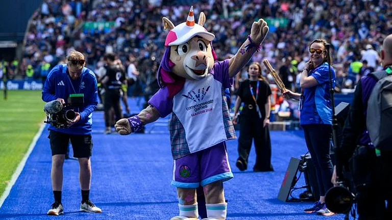 Finnie, the official mascot of the Glasgow Commonwealth Games 2026, greets fans and poses inside the OVO Hydro ahead of the Opening Ceremony, building excitement before the Games officially begin. - X/India_AllSports