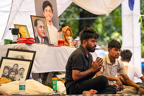 Cockroach Janta Party (CJP) founder Abhijeet Dipke during a protest demanding the resignation of Union Education Minister Dharmendra Pradhan over alleged irregularities in the NEET examination, in New Delhi.
